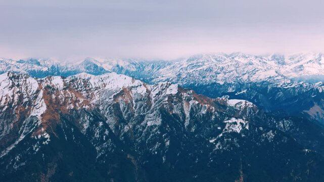 Close-up drone footage of Nanda Devi's snowy ridges in the Himalayas
