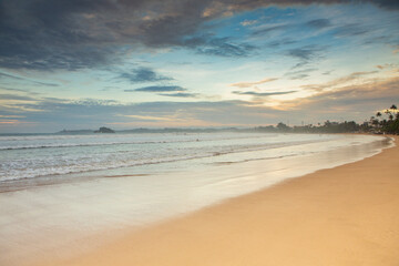 Surfing Paradise and golden beach in Weligama coast of Indian ocean in Sri Lanka. A favorite...