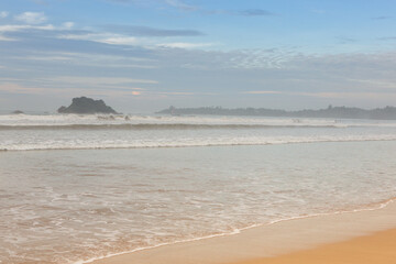 Surfing Paradise and golden beach in Weligama coast of Indian ocean in Sri Lanka. A favorite...