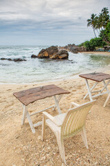 Surfing Paradise and golden beach in Weligama coast of Indian ocean in Sri Lanka. A favorite destination for travelers seeking relaxing, swimming, and enjoying the tropical vibe.