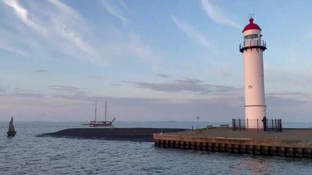 An sail ship sailing before the harbor of Hellevoetsluis, The Netherlands.