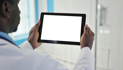 African doctor holding in hands using digital tablet computer mock up white screen consulting patient online video calling sit at work desk. Telemedicine video call consultation concept. Close up view