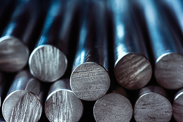 Macro view of stack aluminum rods, metallurgical industry products