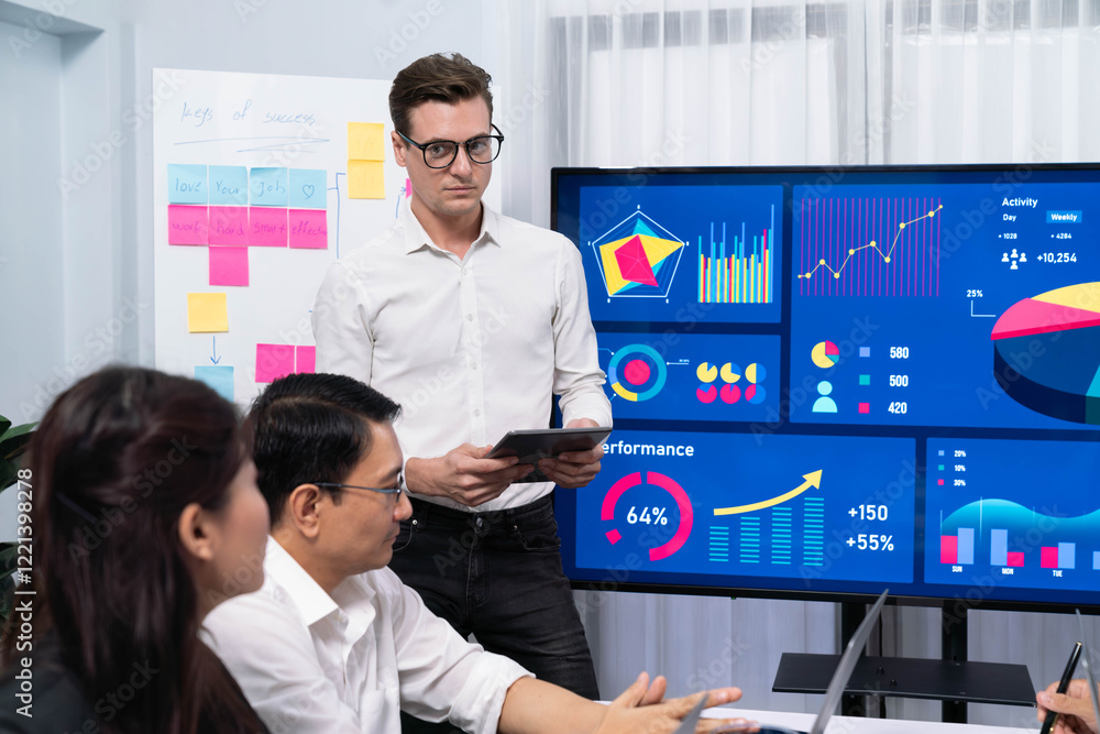 Fototapete Presentation in office or meeting room with analyst team utilizing BI Fintech to analyze financial data. Businesspeople analyzing BI dashboard power display on TV screen for strategic planning.Prudent