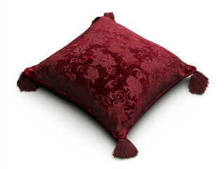 Luxurious red decorative pillow with tassels and intricate patterns