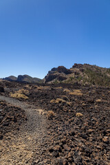 Desert landscape, arid in spain in the Teide national park on the island of Santa Cruz de Tenerife. Concept: Desert, tourism, desert, travel.