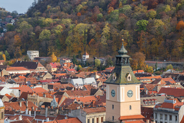 Fototapeta premium Zoom on the tower of the Council's House, Casa Sfatului on thePiata Sfatului council square in Brasov, Transylvania, Romania. Beautiful famous must-see tourist attraction. Travel destination