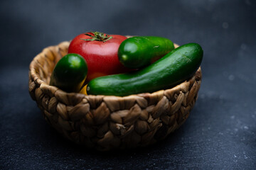 Delicious service consisting of vegetables such as tomatoes, cucumbers and lemons, carefully prepared with artificial light