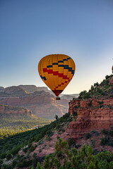Colorful Hot air balloon in Sedona Arizona Red Rock Mountain Scenic Dawn Sunrise Valley © Jose
