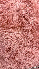 Soft Pink Fluffy Rug Texture Close-Up, Perfect For Feminine Home Decor, Cozy Interiors, And Modern Textile Projects Highlighting Warmth And Comfort.