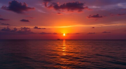 Obraz premium Colorful sunset over ocean on Maldives sunset