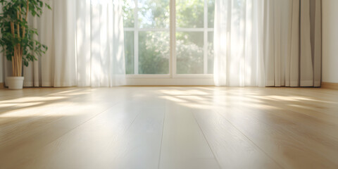 Fototapeta premium Sunlight streams through sheer curtains onto a light hardwood floor, creating a bright and airy atmosphere in a minimalist room. Perfect for showcasing products or creating a serene background.
