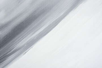 Obraz premium A person enjoying the winter sport of snowboarding on a snowy hillside