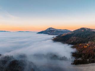Misty morning in Liptov region with High Tatras mountains around. Liptovsky Mikulas landspace, slovakia.