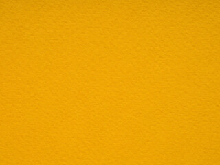 Sun-kissed parchment: a textured expanse of vibrant yellow, stirring up images of bright summer days
