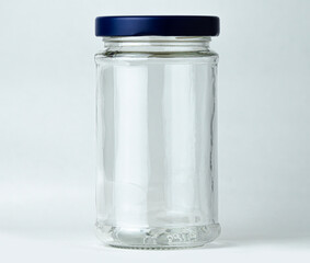 Clear glass jar on a plain background