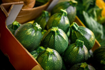 Closeup on zucchini in a wooden box