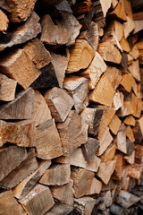 Stack of firewood creating a rustic and warm atmosphere