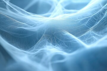 Naklejka premium Abstract image of a delicate, light blue spiderweb, resembling a flowing fabric.