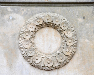 Stone Carving of a Poppy Wreath on Hitchin War Memorial, UK