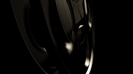 Movie tape, graphics composition detail element. Reel tape spool rolling in a dark classic cinema concept. CG close up shot, ideal for movie show intros, logos or transitions