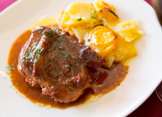 Traditional spanish dish galtas al chocolate, pork cheeks in dark chocolate