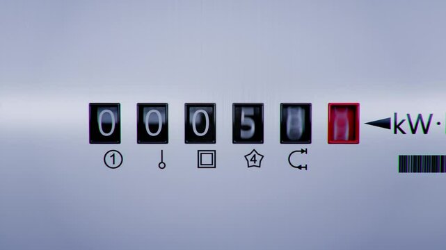 Close-up view of electrometer measuring electricity consumption. Animation with kWh counter. Electric meter display changing numbers. Concept of rising costs of electric power. Home power supply.