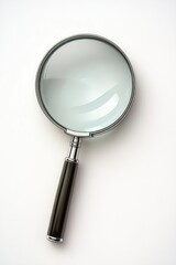 A close-up of a magnifying glass on a white surface, ideal for illustrating detective work or scientific investigation