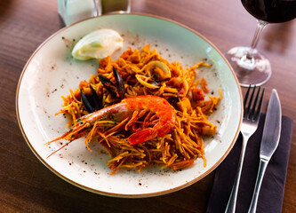Seafood fideua, rich in taste, bright and unforgettable dish