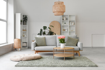 Interior of modern living room with soft sofa and coffee table