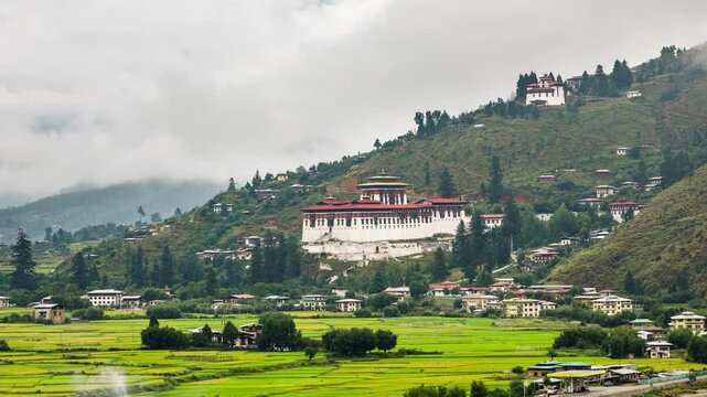 Looking out over the city of Paro in Bhutan. The Rinpung Dzong can be seen. Time Lapse.