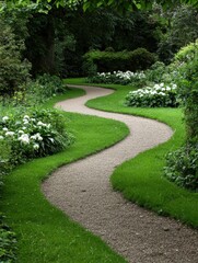 Winding garden path through lush green grass and white flowers