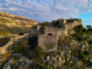 Fototapeta premium fantasy ancient fortress in montenegro - aerial view.