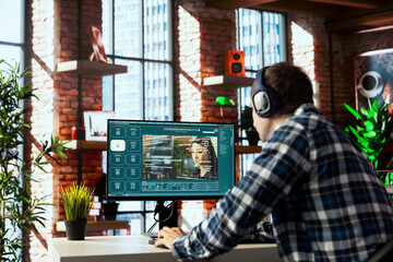 Man listening music uses AI GPT application turning text prompt into photos. Person wearing headphones, hearing podcasts, using text to image generative models with neural network tech