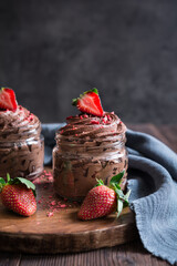 Chocolate mousse topped with fresh and freeze-dried strawberries
