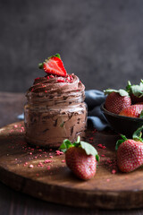 Chocolate mousse topped with fresh and freeze-dried strawberries