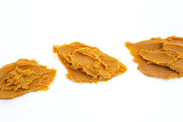Japanese miso paste on white background.
