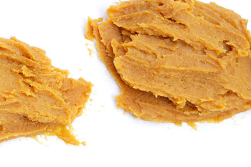 Japanese miso paste on white background.