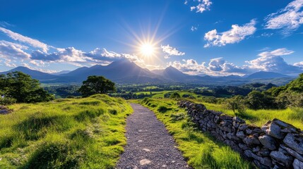 Sunlit path through scenic mountain landscape with dramatic sky and lush greenery