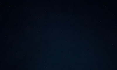 Fototapeta premium The night sky is filled with countless stars in dark deep space perfect for astronomy, astrology, and stargazing-themed designs and projects