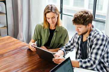 Group of young people working together. Creative business people in modern office