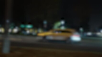 driving plate suburban boulevard defocused at night