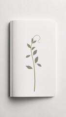Clean white journal featuring hand painted botanical watercolor art on cover placed on bright white background