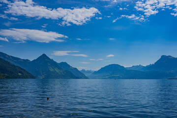 Mountain in the Switzerland in summer, panoramic view with mountain. Switzerland Alps mountains. Alpine mountain scenery. Mountain with lake in Alps. Mountains over the lake and the alps in