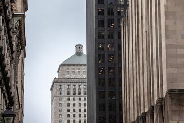 At dusk, skyscrapers and older buildings blend in Old Montreal’s evolving skyline, reflecting a...