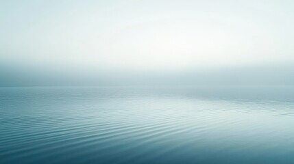 Fototapeta premium Tranquil Misty Water Surface with Gentle Ripples and Calm Atmosphere