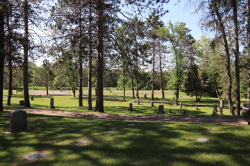 Monuments and graves in a cemetery in rural northern Minnesota