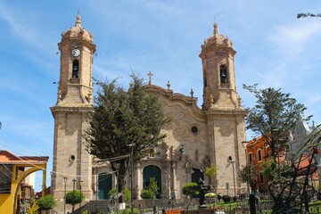 A photograph of historic architecture, colonial buildings, and public spaces in a charming Bolivian...