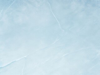 Abstract textured background resembling a frozen ice surface in soft blue tones. Perfect for winter-themed designs, holiday backdrops, or minimalist projects.