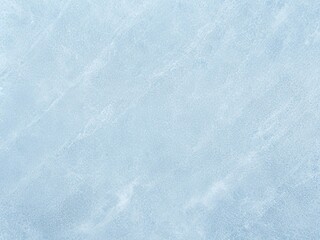 Obraz premium Abstract textured background resembling a frozen ice surface in soft blue tones. Perfect for winter-themed designs, holiday backdrops, or minimalist projects.